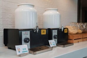 Enjoy freshly brewed coffee and a selection of bread.