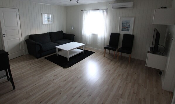 Leilighet – city, 1 queensize-seng med sovesofa, ikke-røyk | Oppholdsrom