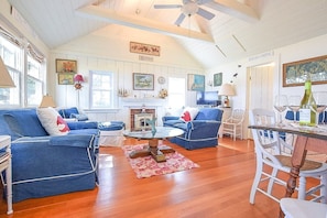 living room with vaulted ceiling