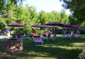 Property grounds - BAITA 1 studio apartment in Residence Villa Carla 2 beds, bathroom, veranda. (Vieste)