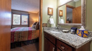 Combined shower/bathtub, hair dryer, towels, soap - Beautifully Furnished, Clean, Cozy Cabin Next to Rocky! Walk to RMNP & YMCA (Estes Park)