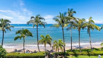 On the beach, sun loungers, beach towels