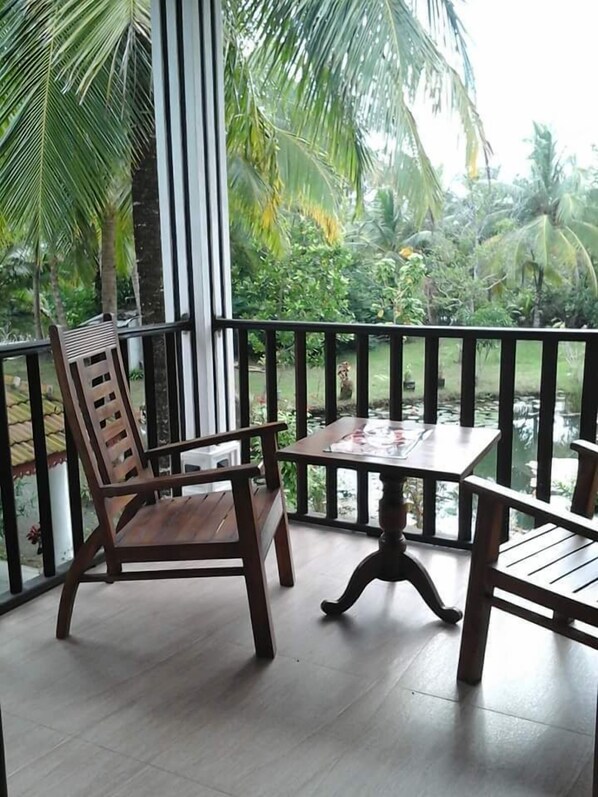 Deluxe Triple Room, Multiple Beds, Non Smoking, Lagoon View | Balcony view