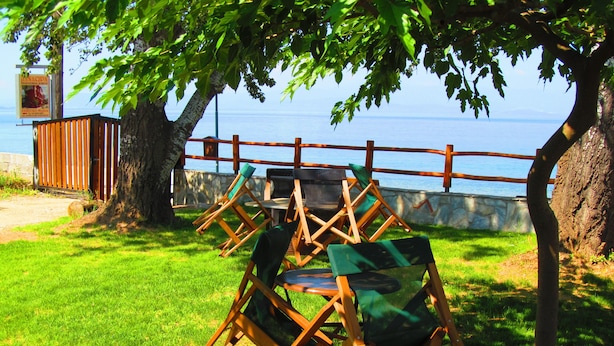 Outdoor seating with a view of the water. - Pandora Studios (South Pelion)