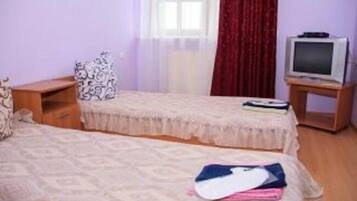 Economy Double or Twin Room, Courtyard View | Blackout drapes, free WiFi, bed sheets