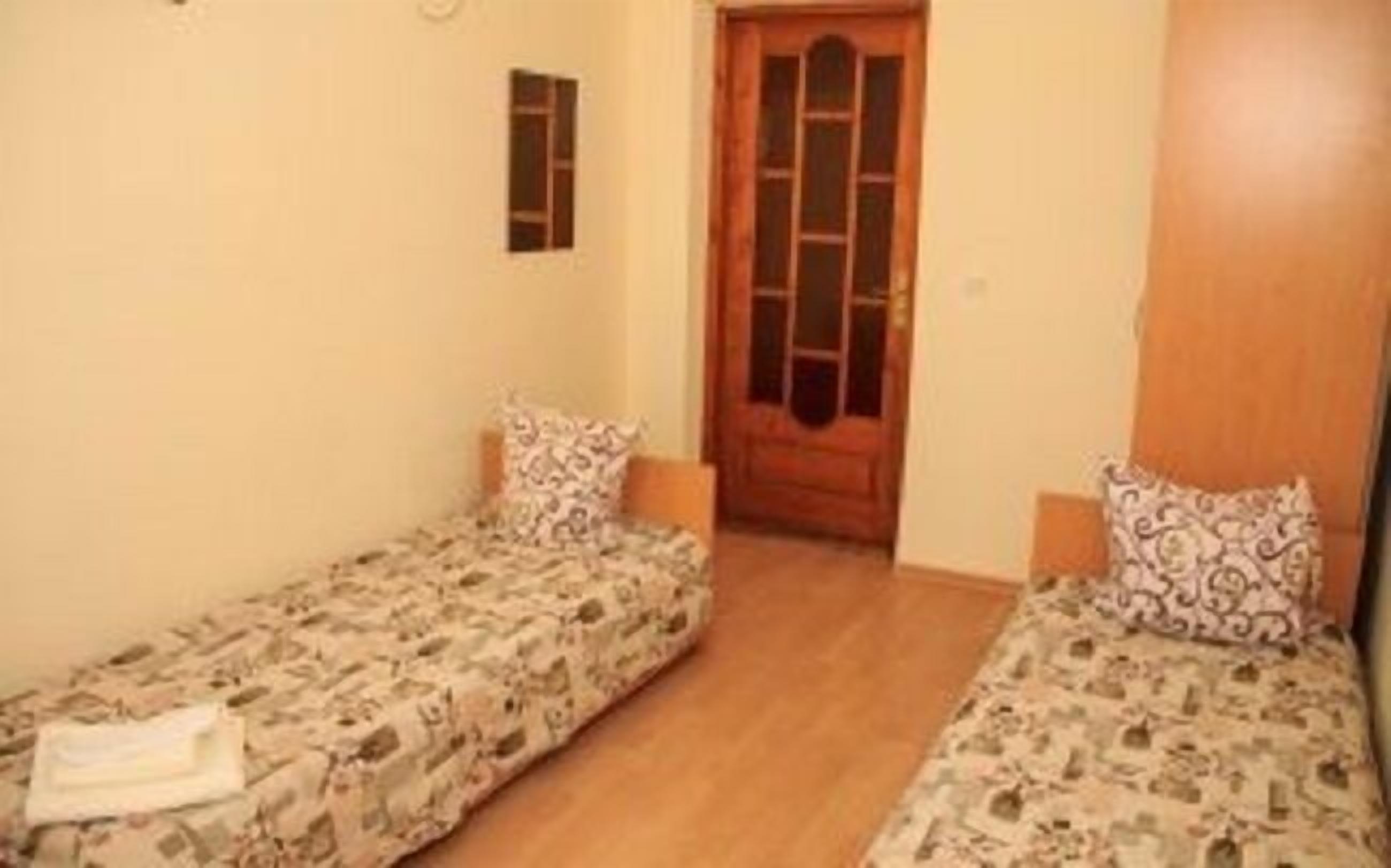 Economy Double or Twin Room, Courtyard View | Blackout drapes, free WiFi, bed sheets