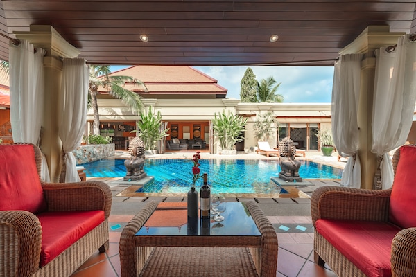 Outdoor pool, free cabanas, pool umbrellas