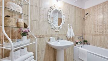 Hair dryer, towels, shampoo