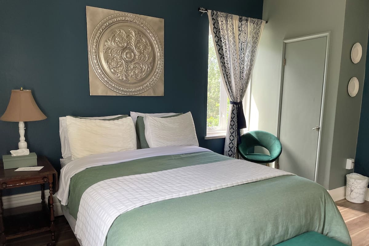 Habitación Deluxe | Ropa de cama de alta calidad y decoración personalizada