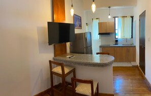 Suite estudio familiar, cocina | Cocina privada | Frigorífico