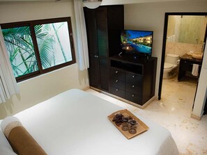 2 quartos, ferros/tábuas de passar roupa, berço de viagem