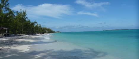 On the beach, sun-loungers, beach towels