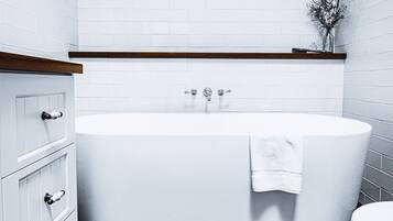Bathtub, hair dryer, towels