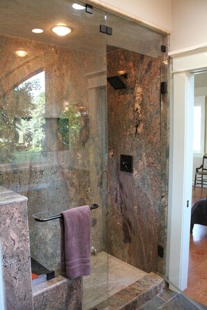 Shower, hair dryer, towels, toilet paper