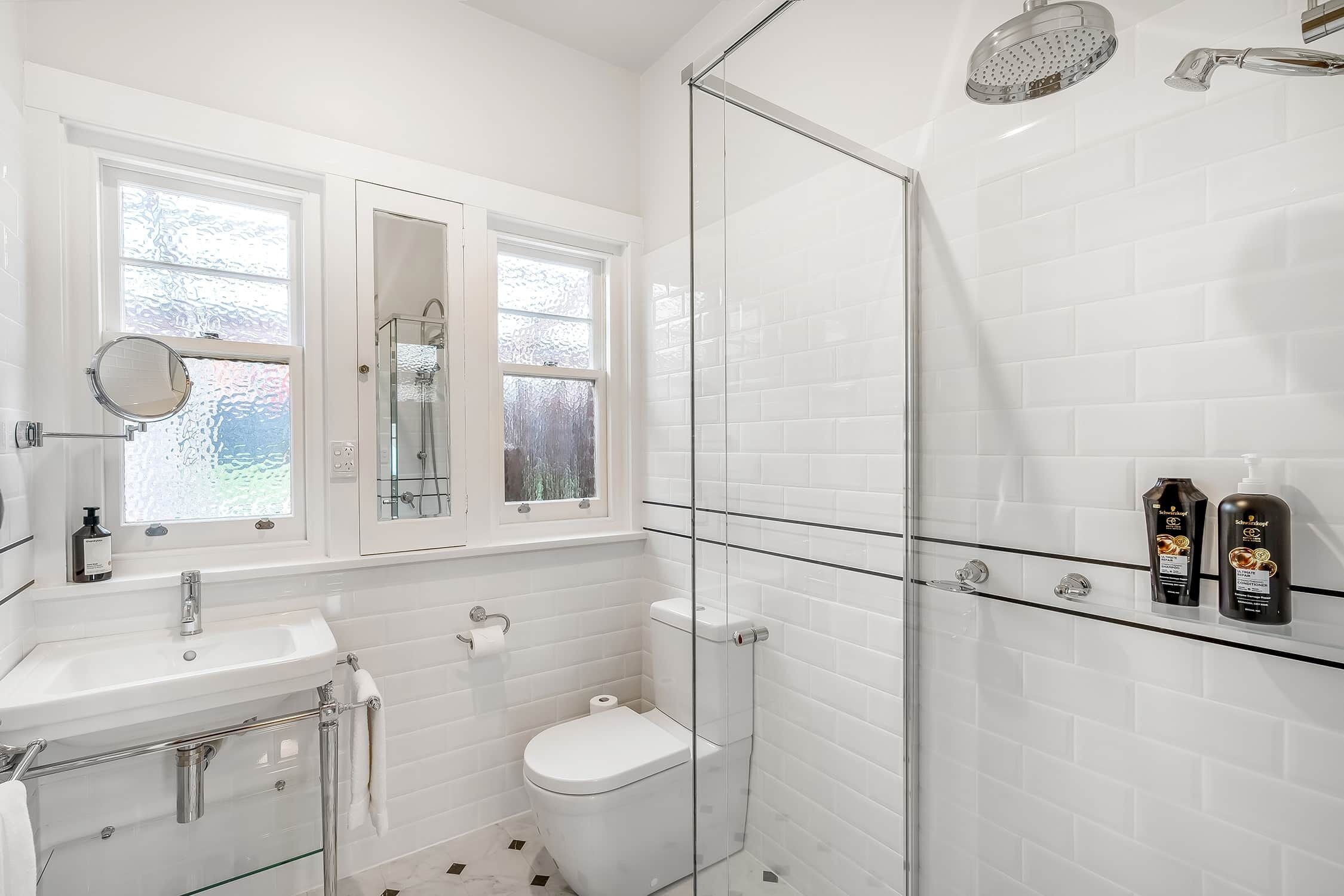Combined shower/bathtub, hair dryer, bathrobes, towels