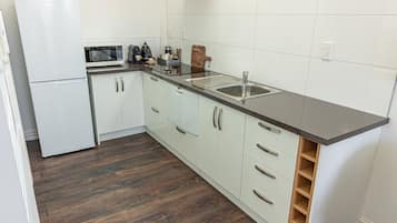 Fridge, microwave, dishwasher, coffee/tea maker