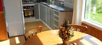 Relax a Lodge MoonShine 2 Bedroom Cottage: farm animals, pool, organic orchard!