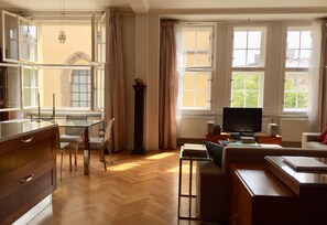 TV, DVD player, books, video library
