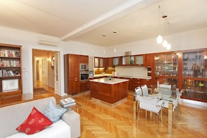 Spacious open-plan design.  Beautiful parquet floors.