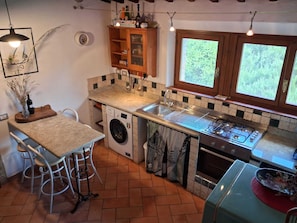 Fridge, oven, coffee/tea maker, toaster