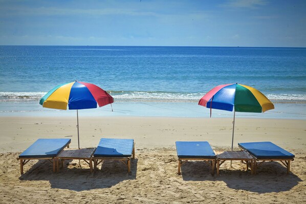 On the beach, beach towels