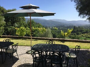Outdoor dining - Renovated farmhouse in idyllic rural setting with pool and magnificent views (Vila Nova de Cerveira)
