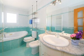 Bathtub, hair dryer