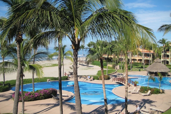 From your balcony see the pool and hot tub and they lead right onto the beach.
