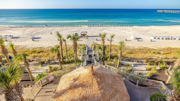 On the beach, sun-loungers