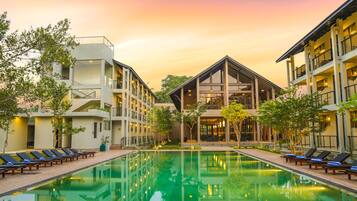 Outdoor pool, open 7:00 AM to 11:00 PM, sun loungers