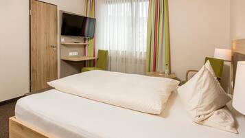 Desk, blackout drapes, free WiFi, bed sheets