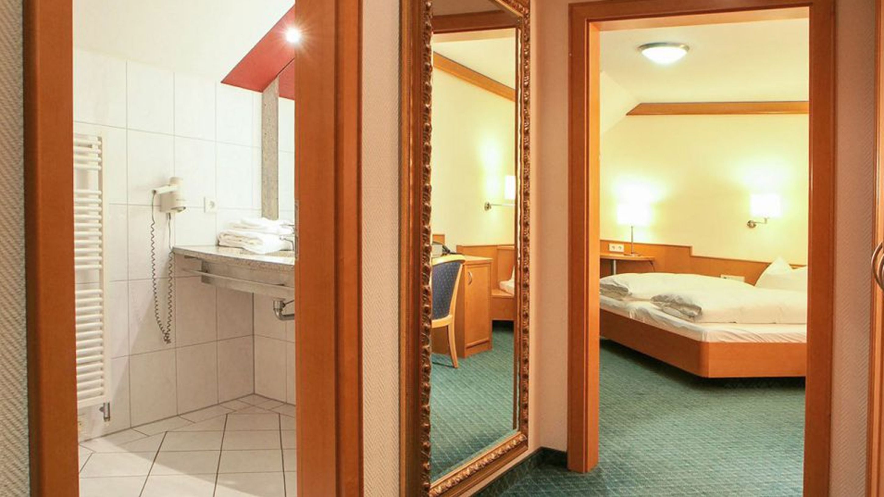 standard double room | bathroom | shower, hair dryer, slippers, towels