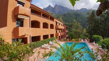 Seasonal outdoor pool, open 9:30 AM to 9:00 PM, sun loungers