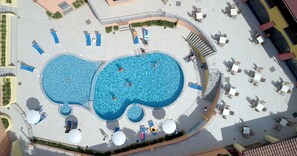Outdoor pool, pool umbrellas, sun loungers