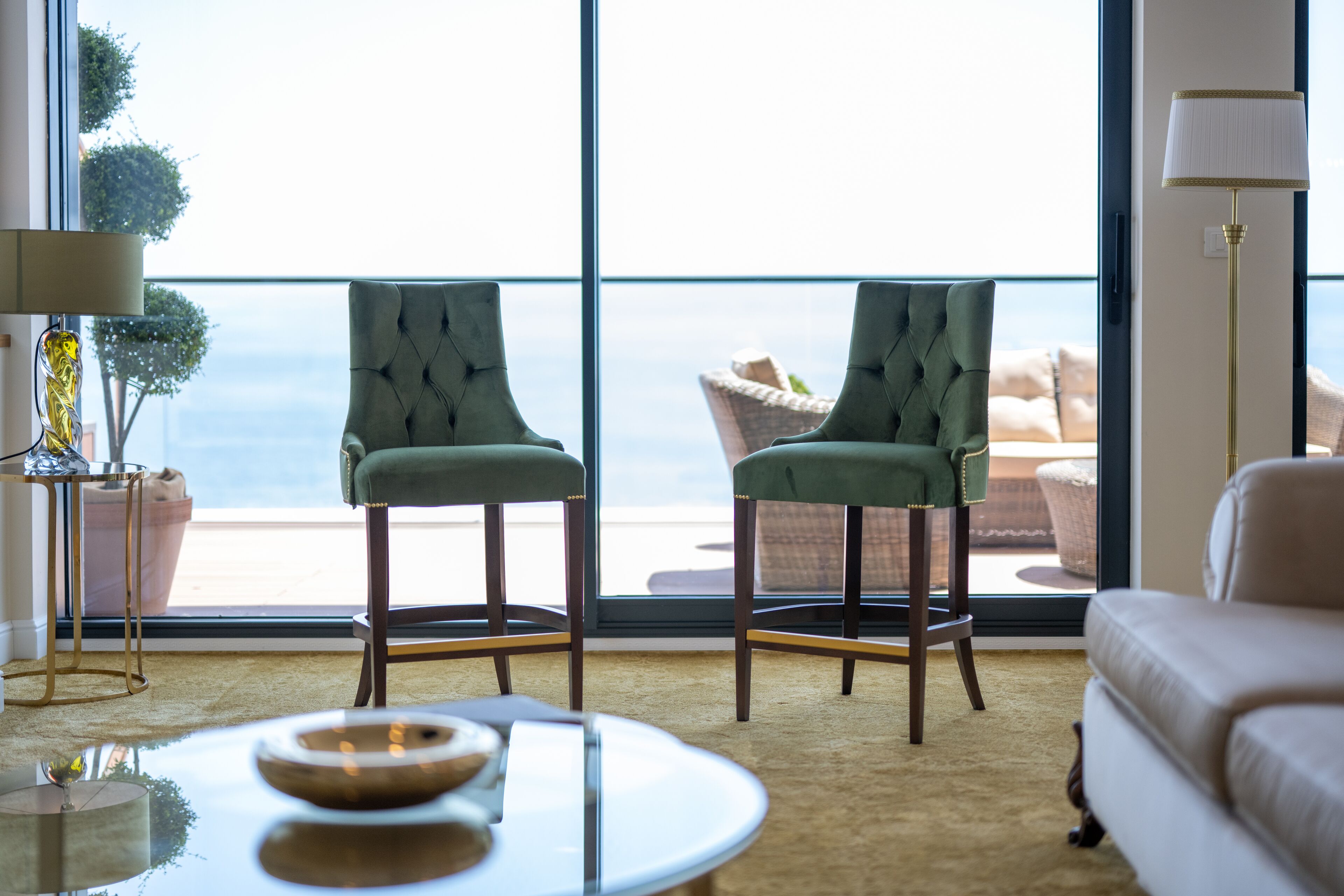 royal penthouse | living area | 60-inch smart tv with digital channels, tv, heated floors