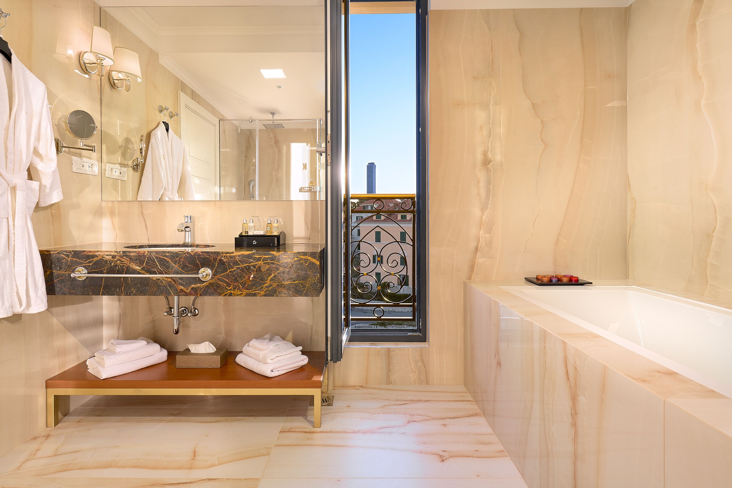 luxury suite (sea front, balcony, jacuzzi) | bathroom | shower, designer toiletries, hair dryer, bathrobes
