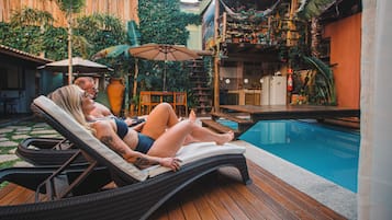 Outdoor pool, open 10:30 AM to 7:30 PM, pool loungers