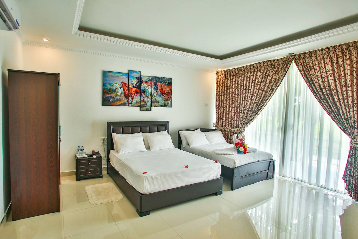 Kamar Triple Deluks, Beberapa Tempat Tidur, Bebas Asap Rokok | Seprai premium dan Wi-Fi gratis