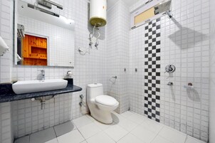 Shower, free toiletries, slippers, towels