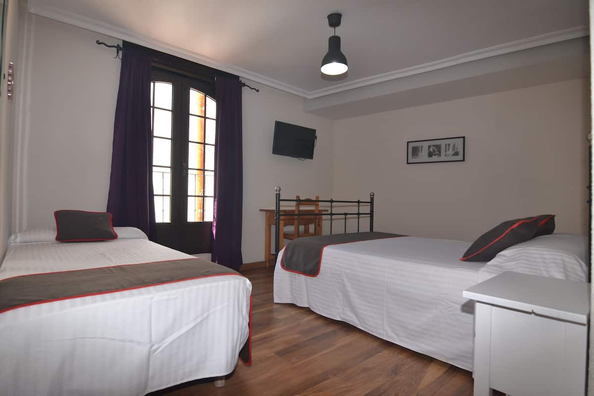 Desk, free WiFi, bed sheets