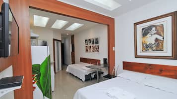 Estúdio, várias camas, para não fumantes | Ferros/tábuas de passar roupa, Wi-Fi de cortesia, roupa de cama