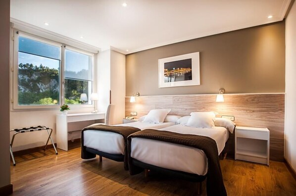 Double or Twin Room | Minibar, in-room safe, desk, blackout curtains