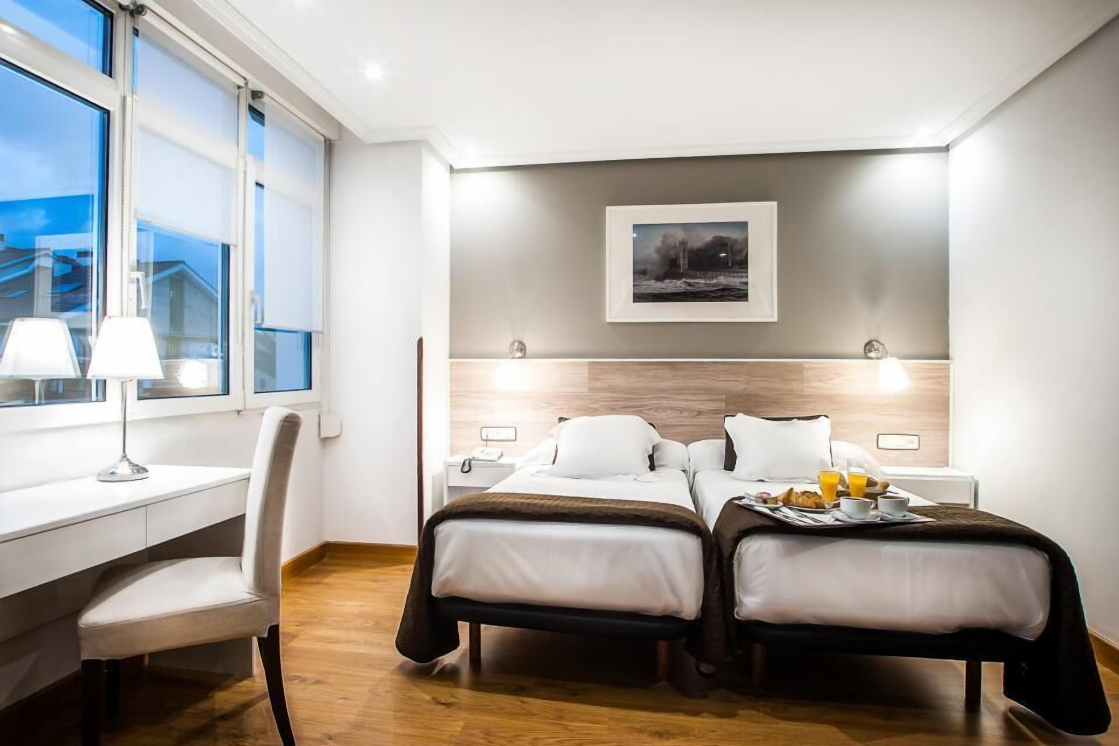 double or twin room | minibar, in-room safe, desk, blackout curtains