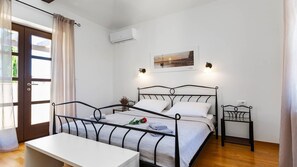 3 habitaciones, tabla de planchar con plancha, wifi y ropa de cama 