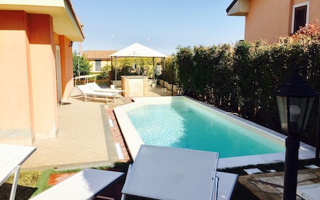 Seasonal outdoor pool, sun loungers