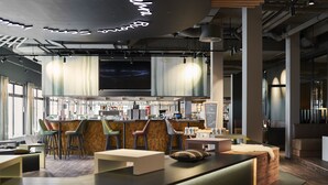 A modern bar area with seating and a bar counter. - aja Ruhpolding (Ruhpolding)