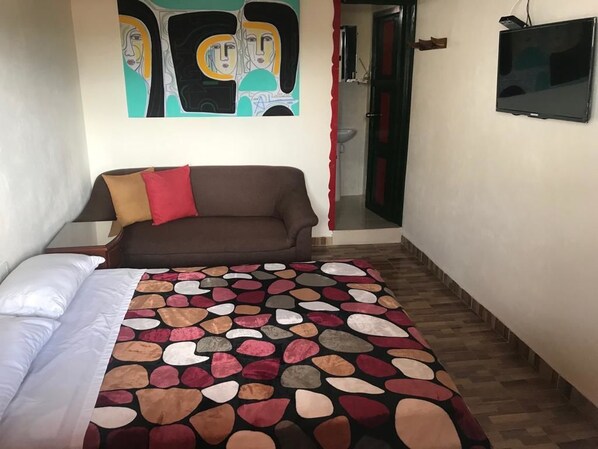 Down comforters, in-room safe, iron/ironing board, free WiFi