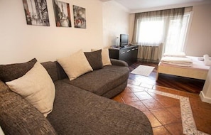 Apartment | Living area | 42-inch flat-screen TV with digital channels, TV