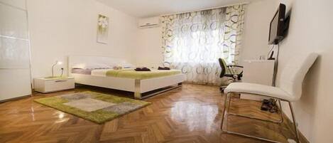 Apartment, 1 Bedroom | 1 bedroom, desk, laptop workspace, iron/ironing board