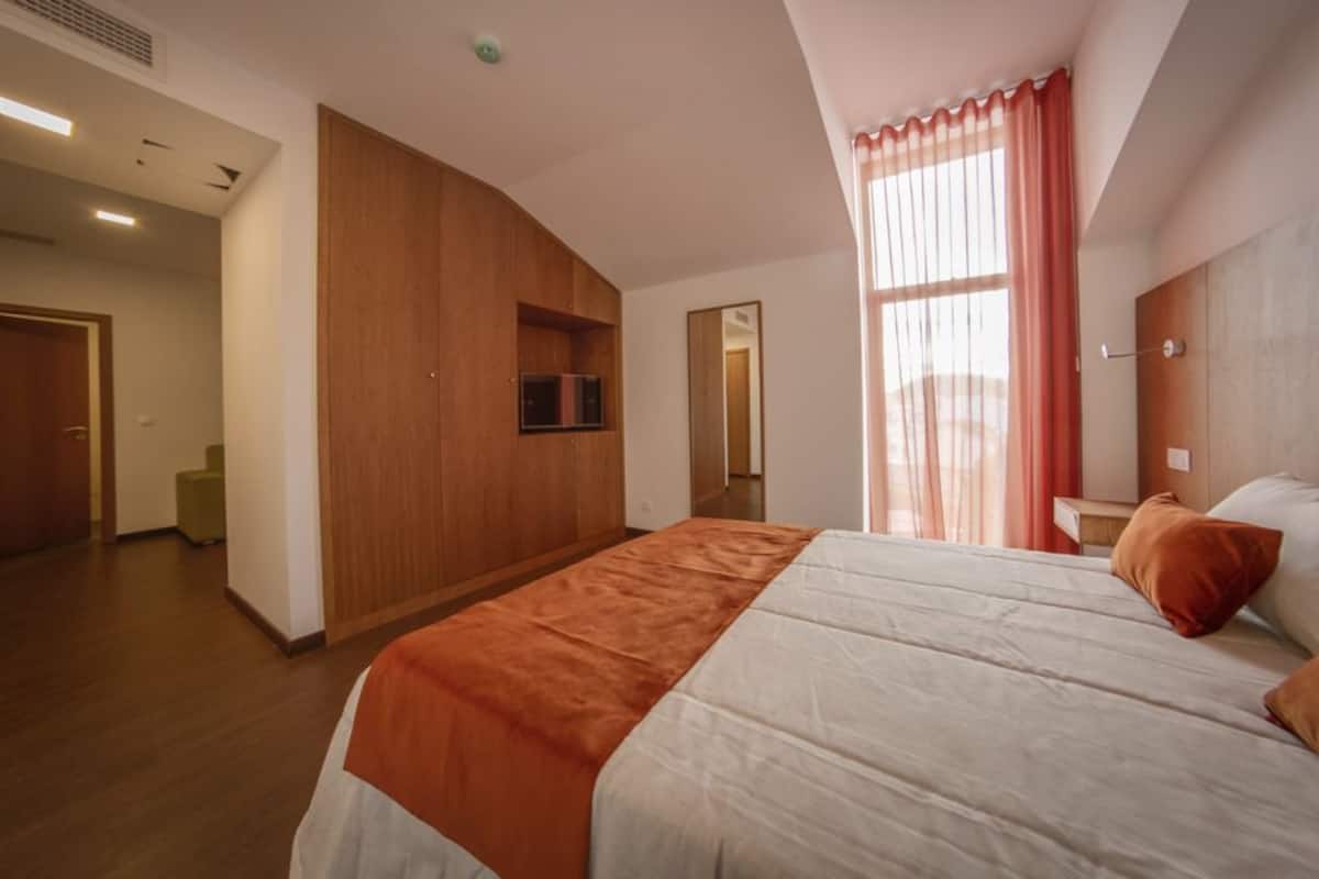 In-room safe, desk, blackout curtains, soundproofing
